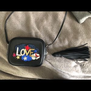 Saint Laurent black Blogger Bag with ‘LOVE’ detail